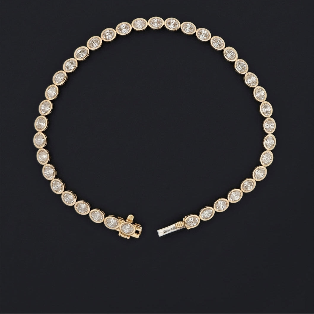 7" 4.9 carat lab-grown oval diamond tennis bracelet in yellow gold