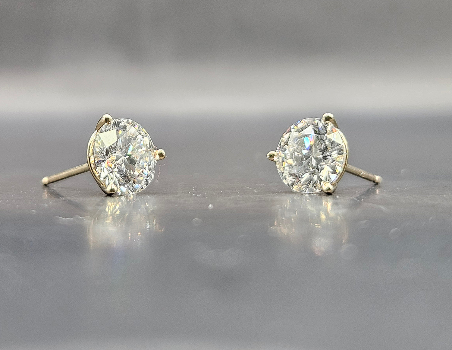 2 carat total weight, 1 carat each, lab-grown diamonds in a 3 prong martini setting stud earring - white gold