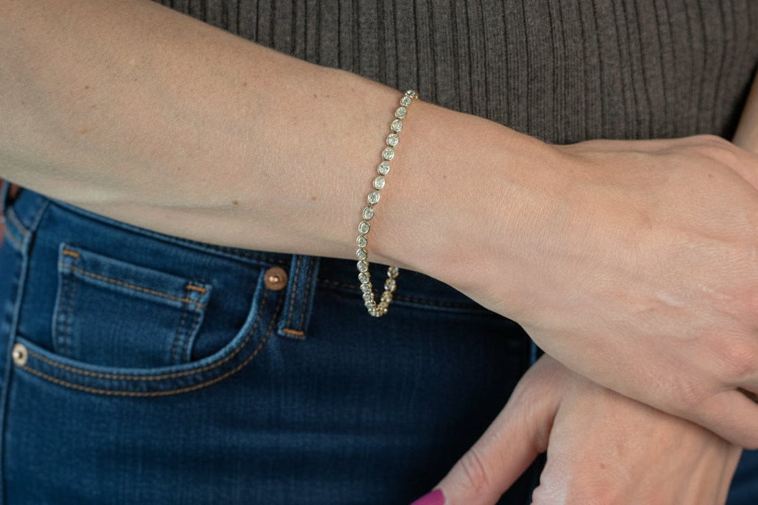 yellow gold lab-grown oval tennis bracelet