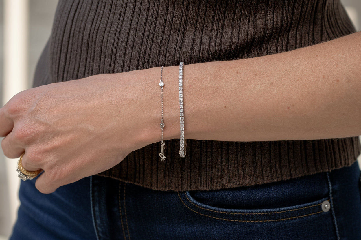 station bracelet and 4 carat total weight tennis bracelet - both in white gold